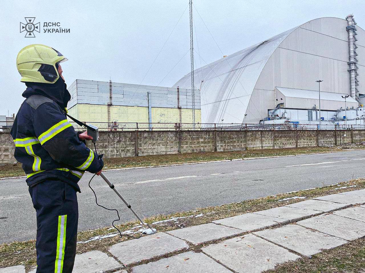 Emergency crews continue work on the damaged New Safe Confinement after a Russian drone strike, partially opening sections of the structure to extinguish smouldering areas. Photo credit: SES Ukraine
