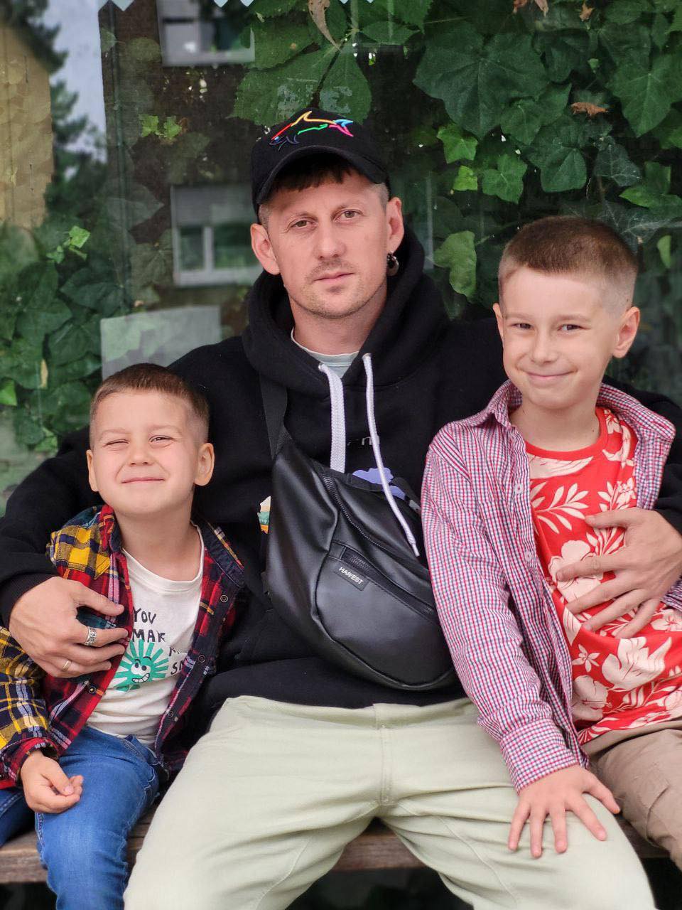 Dmytro with his two sons.